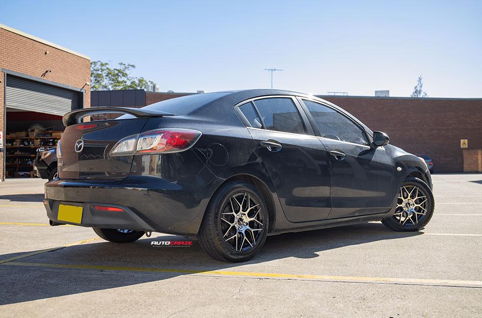 MAZDA-3-PODIUM-PIANO-BLACK-MACHINED