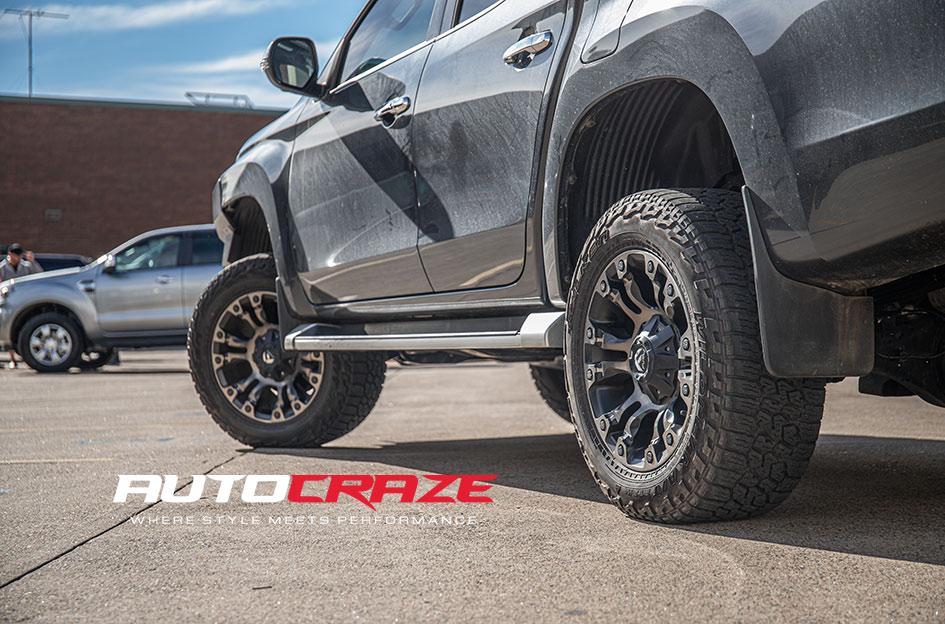 MITSUBISHI TRITON VAPOR BLACK MACHINED WITH DARK TINT