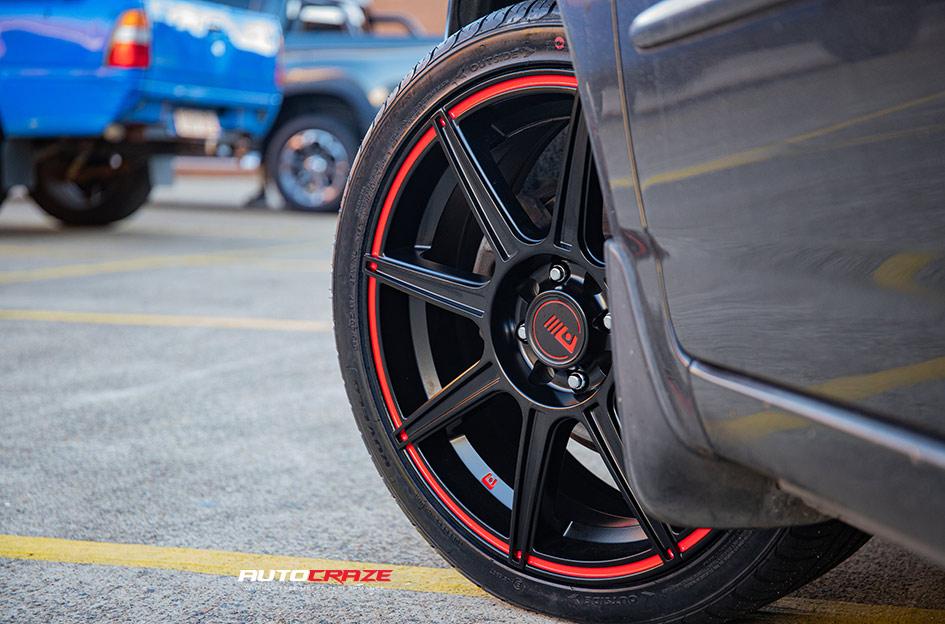 TOYOTA COROLLA MR142 SATIN BLACK W  RED STRIPE