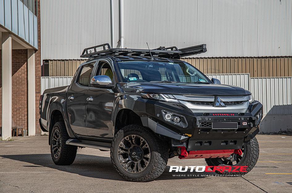 MITSUBISHI TRITON VAPOR BLACK MACHINED WITH DARK TINT