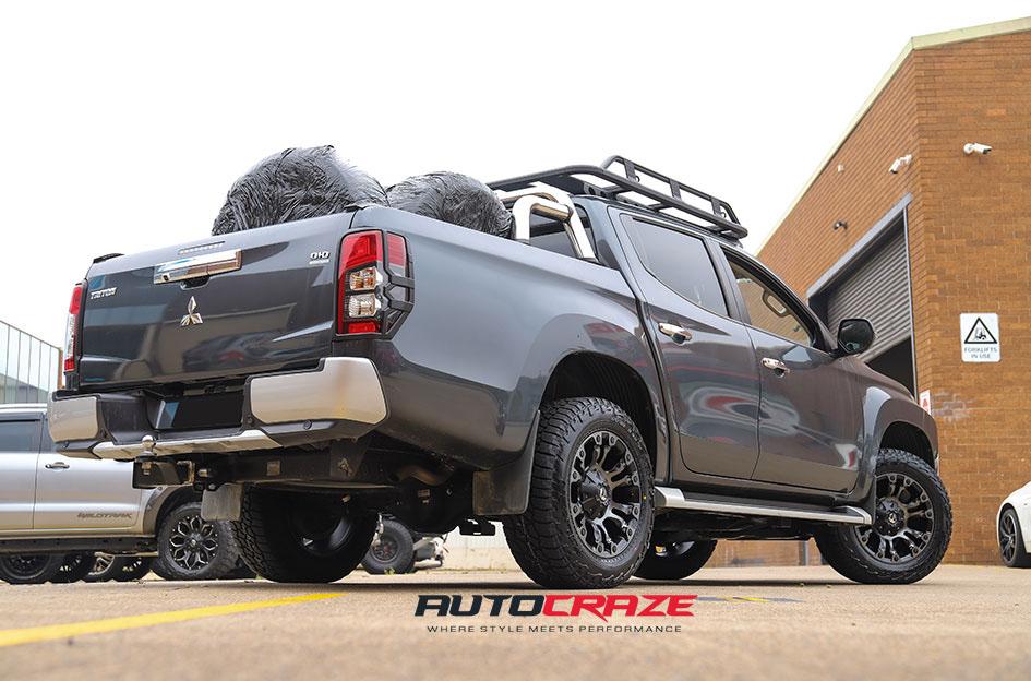 MITSUBISHI TRITON VAPOR BLACK MACHINED WITH DARK TINT