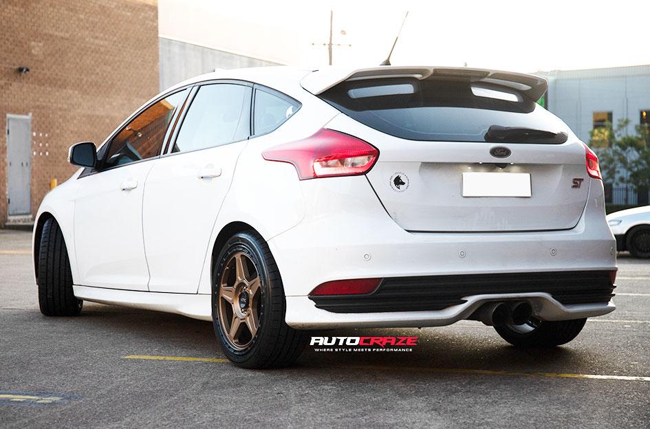 FORD FOCUS 5 STUD ALPINE BRONZE W BLACK LIP WHEELS