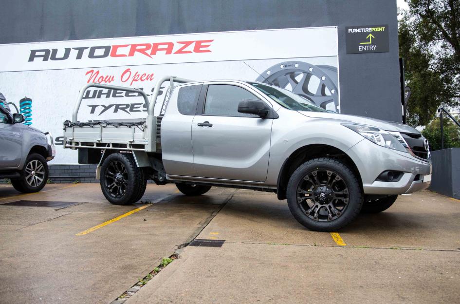 MAZDA BT 50 VAPOR BLACK MACHINED WITH DARK TINT
