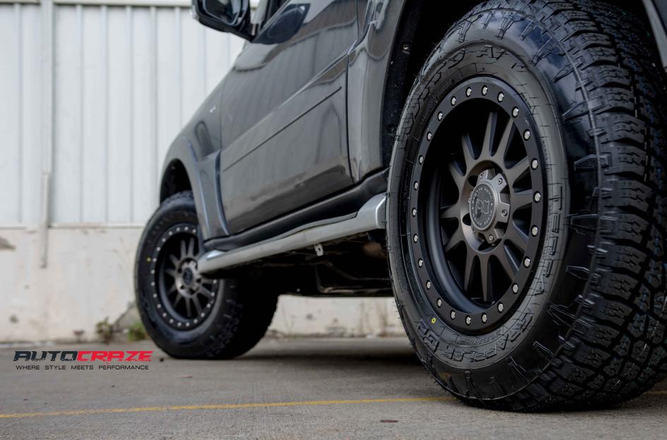 MITSUBISHI PAJERO TANAY MATTE BLACK MACHINED FACE WITH DARK MATTE TINT