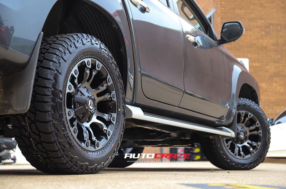 MITSUBISHI TRITON VAPOR BLACK MACHINED WITH DARK TINT