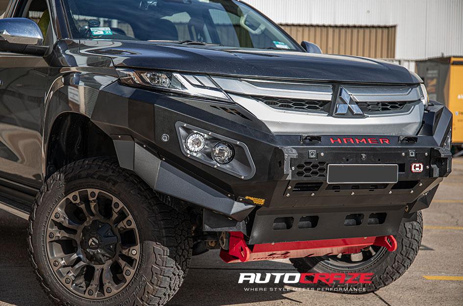 MITSUBISHI TRITON VAPOR BLACK MACHINED WITH DARK TINT