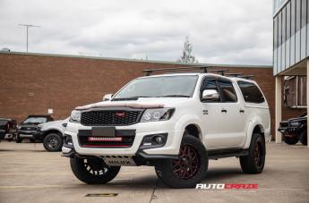 TOYOTA HILUX 4WD GRENADE XD SATIN BLACK WITH RED MILLED