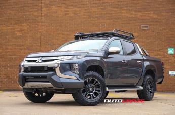 MITSUBISHI TRITON VAPOR BLACK MACHINED WITH DARK TINT
